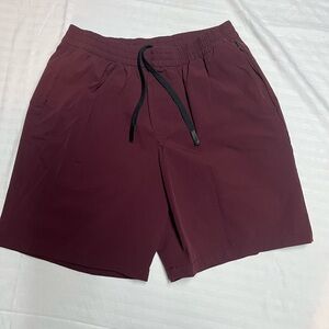 Gapfit men’s linerless athletic shorts size small, color dark mauve.
